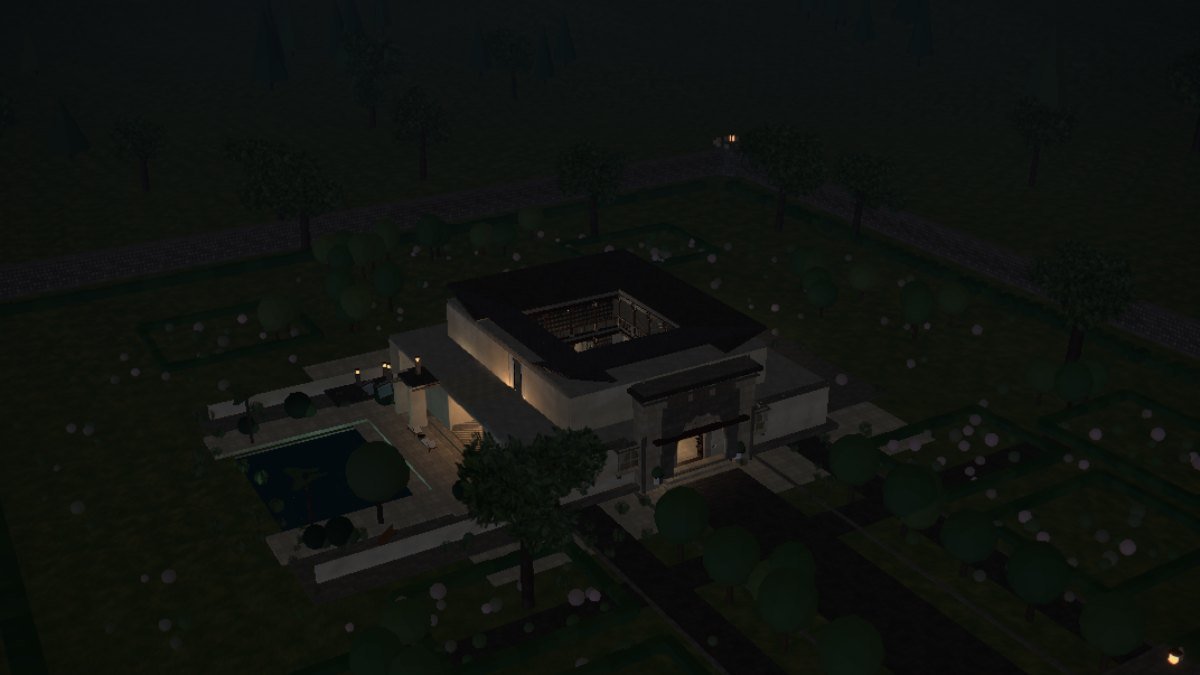 AANGAN — the residence at night, lit from within